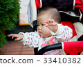 Baby reaching for something 33410382
