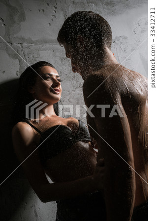 Passionate couple enjoying intimate moment Passionate couple enjoying intimate moment 33412711