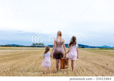 Mother and Little girls in classic dress Mother and Little girls in classic dress 33415964
