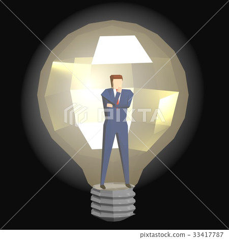 Businessman in a glowing light bulb 33417787