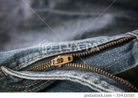 brass zipper of old fade denim jeans brass zipper of old fade denim jeans 33418585