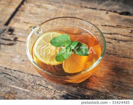 Ginger tea and mint with lemon Ginger tea and mint with lemon 33424485