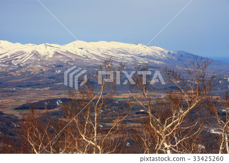 Niseko mountain range of early spring seen from Honjo mountain climbing 33425260