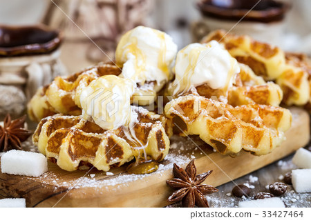 Waffers with ice cream and honey Waffers with ice cream and honey 33427464