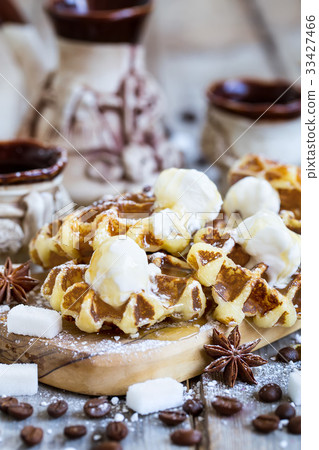 Waffers with ice cream and honey Waffers with ice cream and honey 33427466
