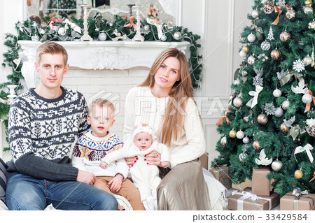 Happy family in Christmas morning in home Happy family in Christmas morning in home 33429584