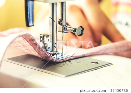 Sewing process on the sewing machine Sewing process on the sewing machine 33430786