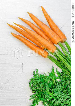 A bunch of carrots on white background A bunch of carrots on white background 33430800