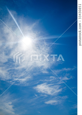 Sun with lens flare, on blue sky background. Sun with lens flare, on blue sky background. 33430851