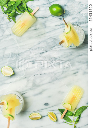 Summer refreshing lemonade popsicles with lime and 33431520