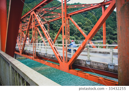Motion blur of car across red bridge at Sakamoto Motion blur of car across red bridge at Sakamoto 33432255