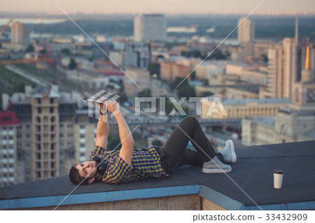 Man makes selfie on roof Man makes selfie on roof 33432909