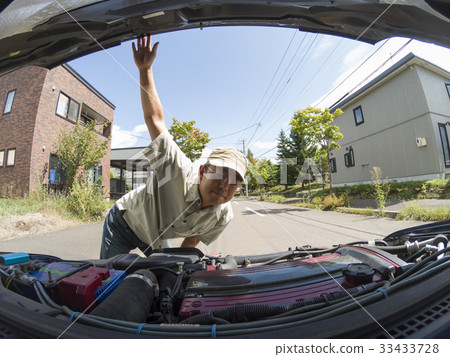 Men looking into the engine room 33433728