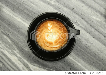 Top view of cappuccino cup on stone table. 33458245