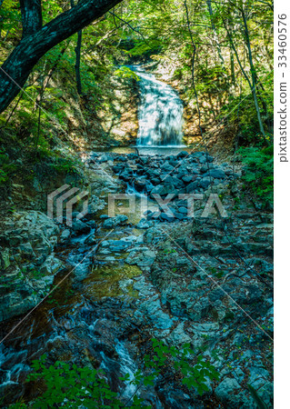 waterfall with stones covered by moss in a forest, waterfall with stones covered by moss in a forest, 33460576