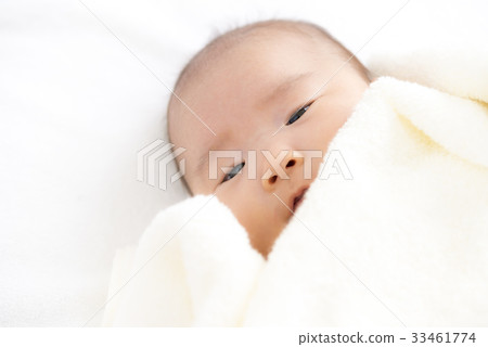 Baby with a towel 33461774