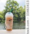 ice coffee on wooden table. 33463413