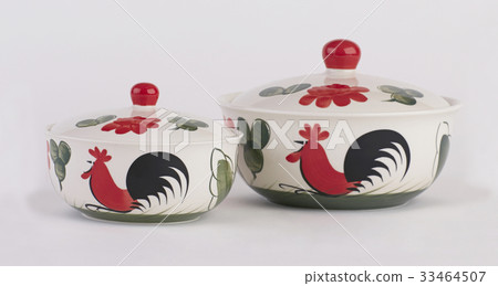 Hand painted ceramic bowls with lids isolated 33464507