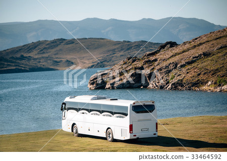 white tourist bus goes to the lake white tourist bus goes to the lake 33464592