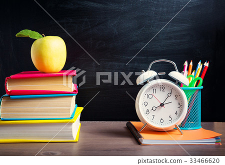 school accessories on the table with blackboard school accessories on the table with blackboard 33466620