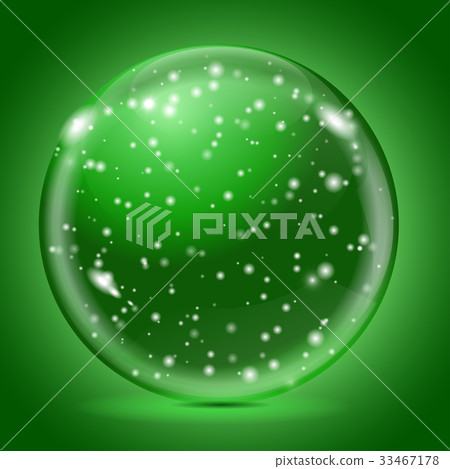 Glass snow ball. Magic green sphere 33467178