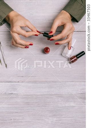 Vertical image of female hands painted nails Vertical image of female hands painted nails 33467503