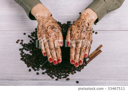 Women showing hands with red manicure Women showing hands with red manicure 33467511