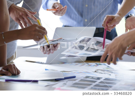 Multinational creative meeting scene 33468820