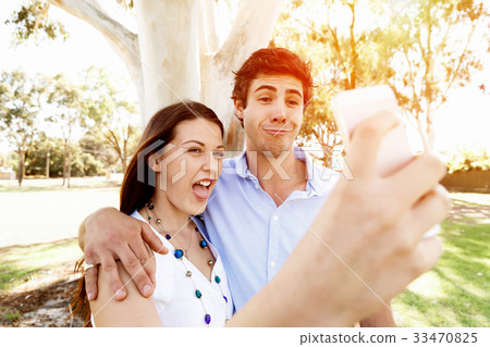Young couple in the park 33470825