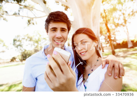 Young couple in the park Young couple in the park 33470936