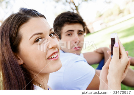 Young couple in the park Young couple in the park 33470937