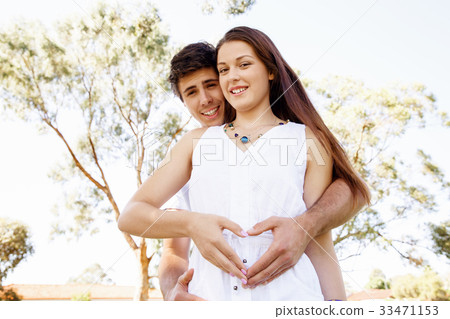 Young couple in the park Young couple in the park 33471153