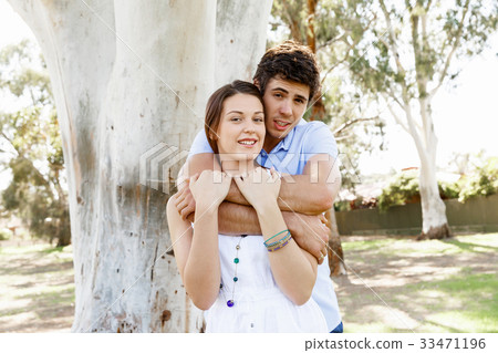 Young couple in the park Young couple in the park 33471196