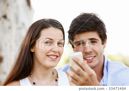 Young couple in the park Young couple in the park 33471484