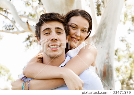 Young couple in the park Young couple in the park 33471579