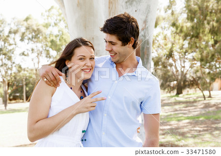 Young couple in the park Young couple in the park 33471580