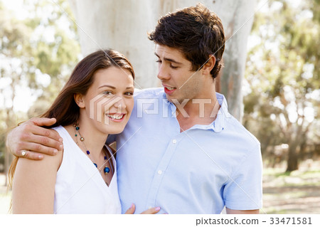 Young couple in the park Young couple in the park 33471581