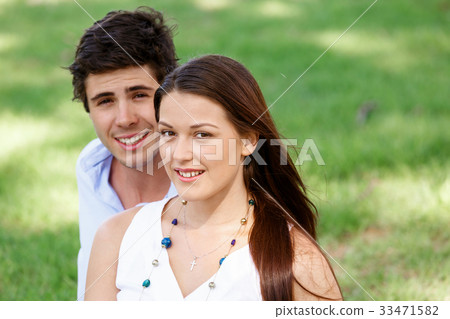 Young couple in the park Young couple in the park 33471582