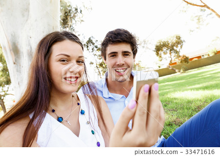 Young couple in the park Young couple in the park 33471616