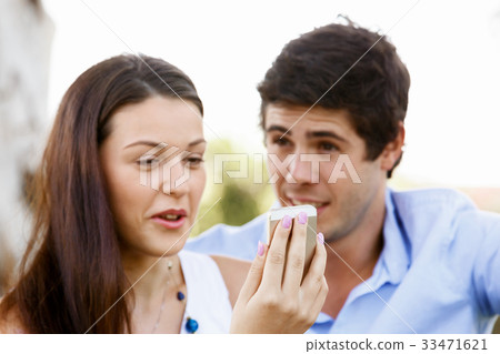 Young couple in the park Young couple in the park 33471621