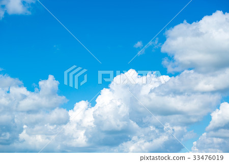 White fluffy clouds in the blue sky White fluffy clouds in the blue sky 33476019