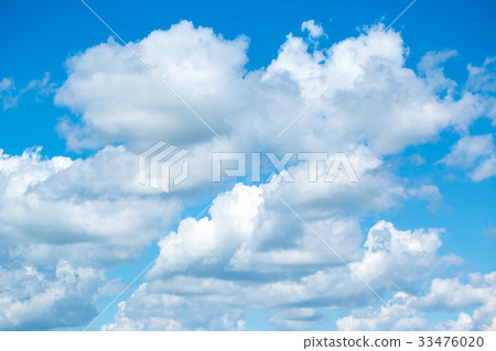 White fluffy clouds in the blue sky White fluffy clouds in the blue sky 33476020