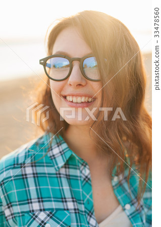 Outdoor portrait summer beach beauty woman smiling Outdoor portrait summer beach beauty woman smiling 33478560