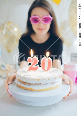 Young woman girl with cake isolated on white Young woman girl with cake isolated on white 33479316