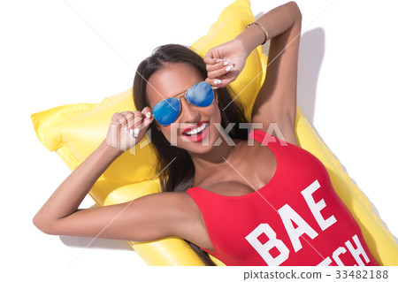 Sexy tanned brunette in sunglasses sunny shot Sexy tanned brunette in sunglasses sunny shot 33482188