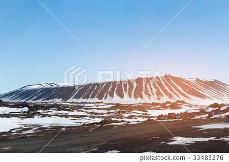 Winter season volcano with blue clear sky Winter season volcano with blue clear sky 33483276