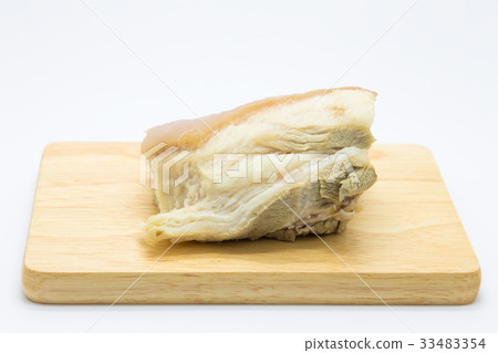 Boiled pork on wooden board, on white Boiled pork on wooden board, on white 33483354