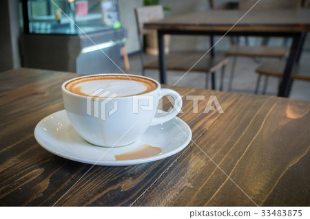 hot coffee mocha with foam milk in vintage cafe hot coffee mocha with foam milk in vintage cafe 33483875
