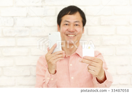 Men with cheap SIM card Men with cheap SIM card 33487058