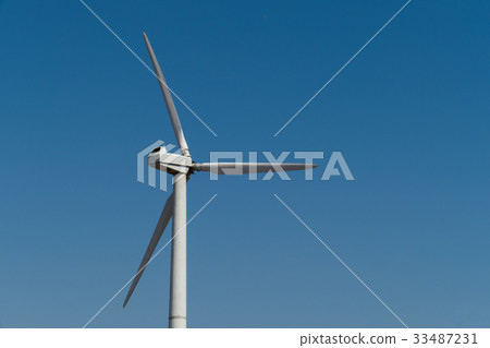 Windmill power generator against sky. Close up Windmill power generator against sky. Close up 33487231